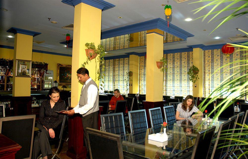 المنامة Concord International Hotel المطعم الصورة
